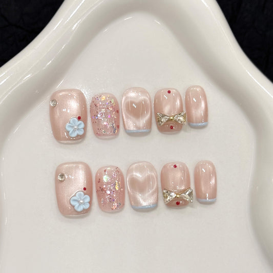 うる艶ピンクの姫系ネイルチップ｜お花＆リボンで甘さ満点♡